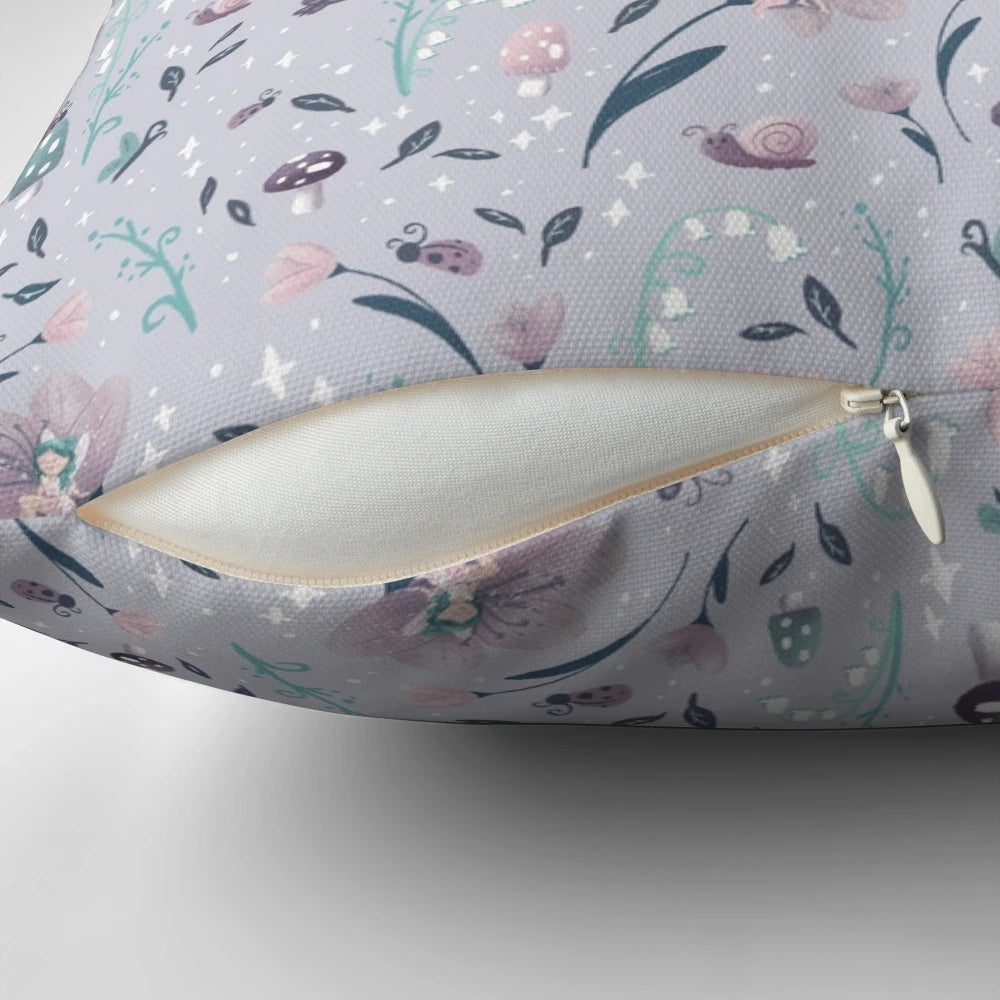 Whimsical purple pillow with fairy garden, mushrooms, and sparkles
