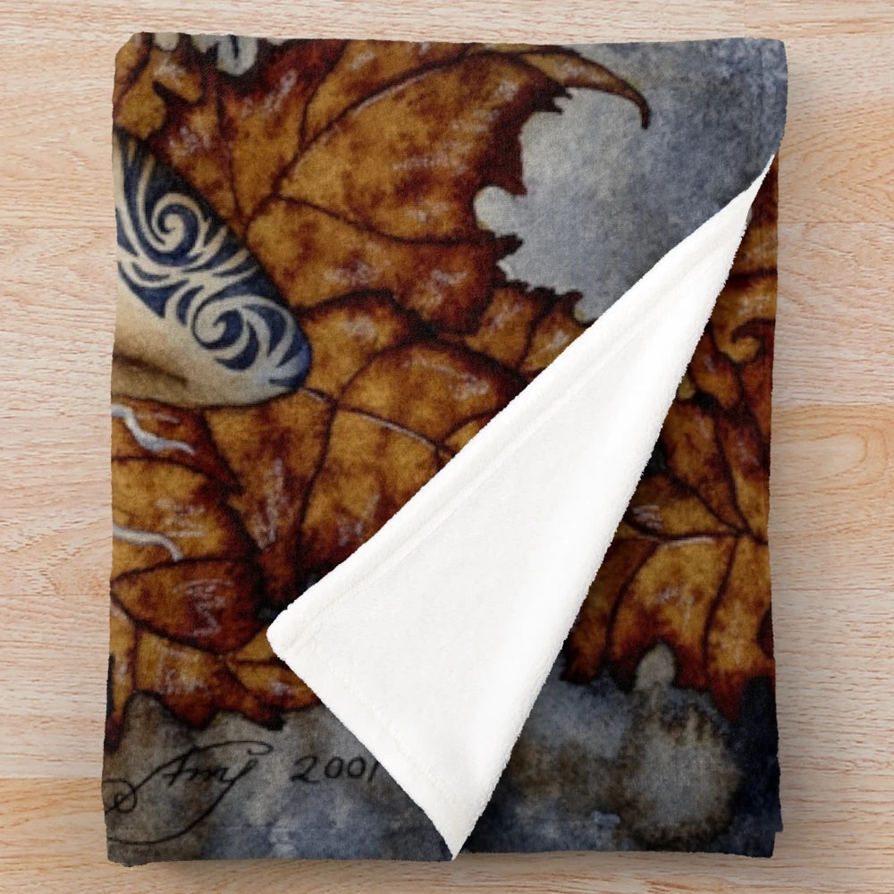 Fairy plush blanket with fantasy artwork and autumn foliage