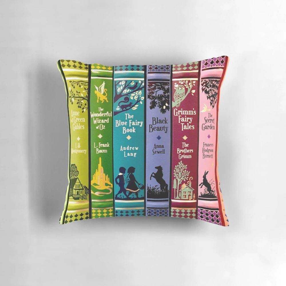 A throw pillow featuring illustrated designs inspired by classic children's literature
