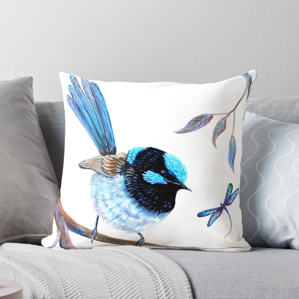 A beautiful decorative pillow featuring a fairy wren and dragonflies in a nature-inspired design.