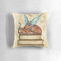 Whimsical fantasy-inspired pillow featuring dragons, fairies, and a magical book motif