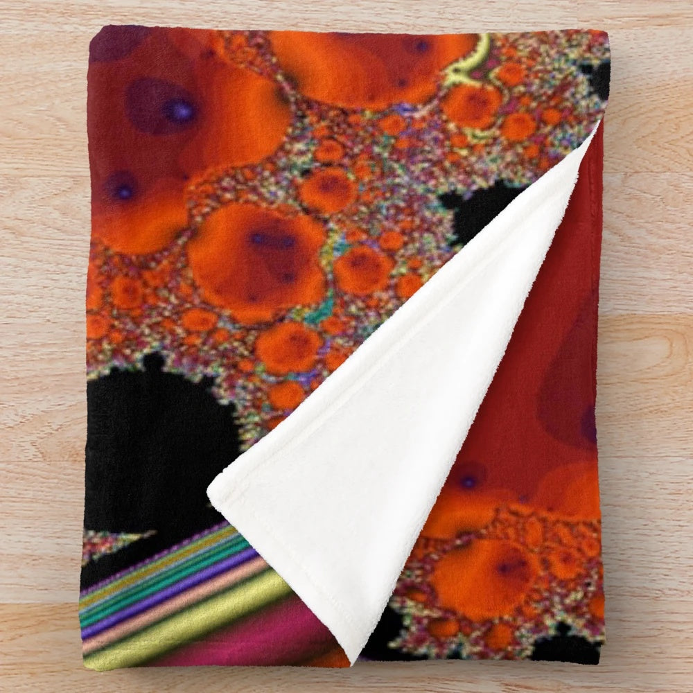Fantasy-inspired plush blanket with colorful abstract patterns