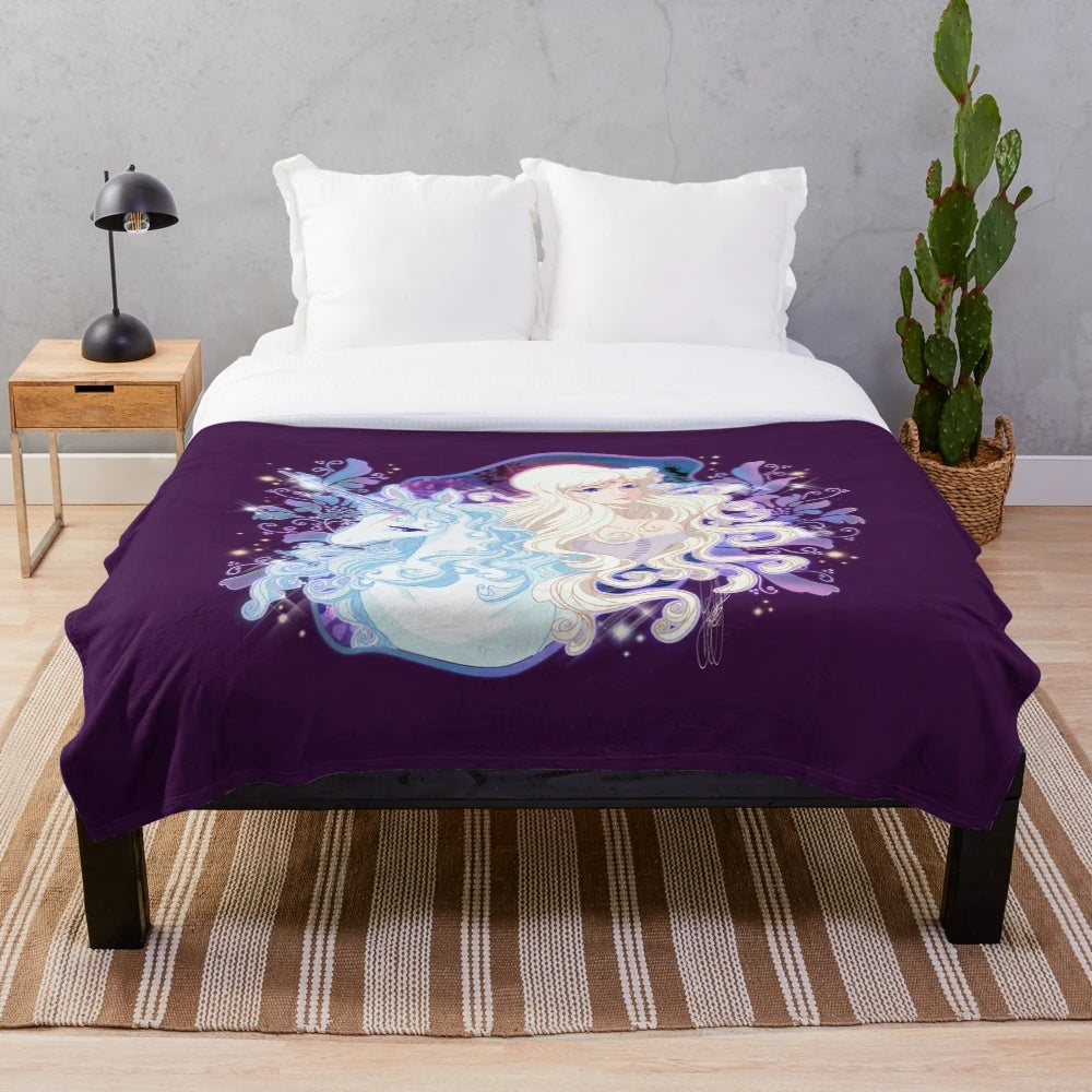Soft, cozy plush unicorn blanket with fantasy design