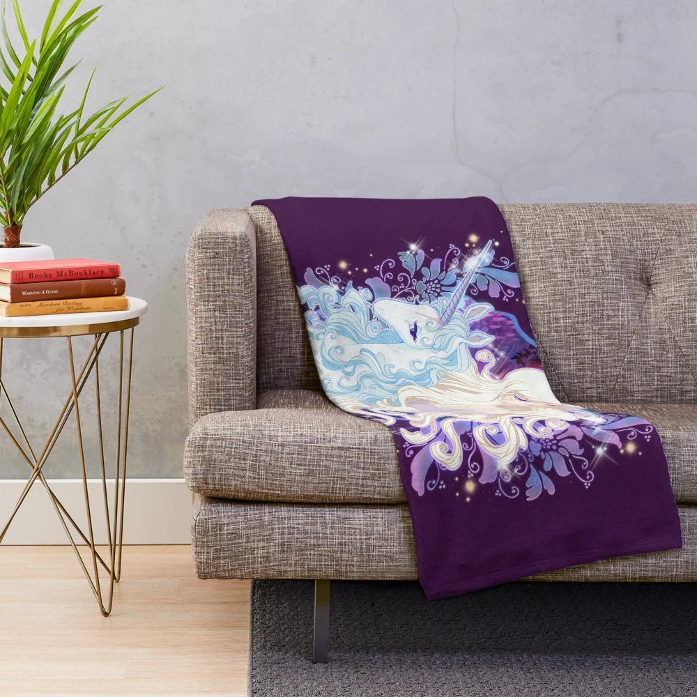 Soft, cozy plush unicorn blanket with fantasy design