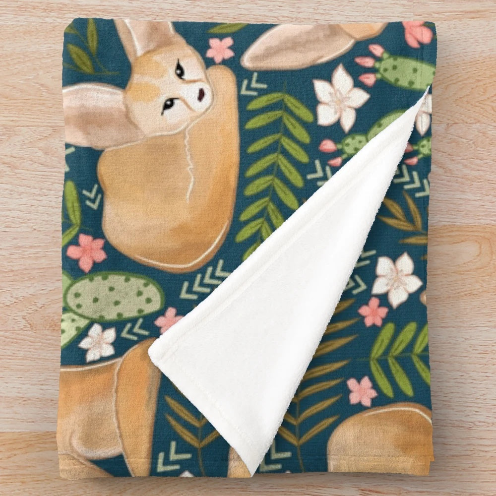 Fennec foxes printed on a soft, plush navy blue blanket