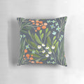 A beautifully designed floral botanical pillow in soothing green, blue, and pink tones.