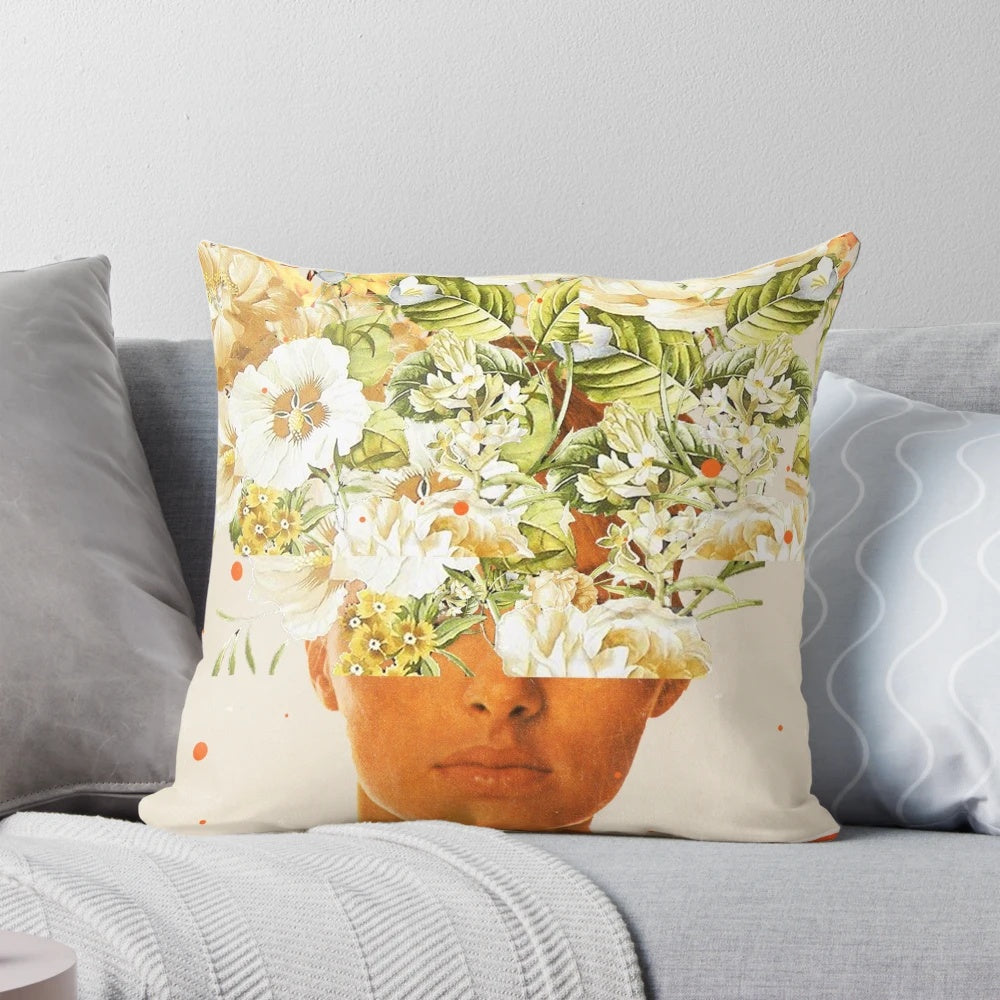 A vibrant, surreal pillow featuring a woman's face adorned with a colorful flower crown design.