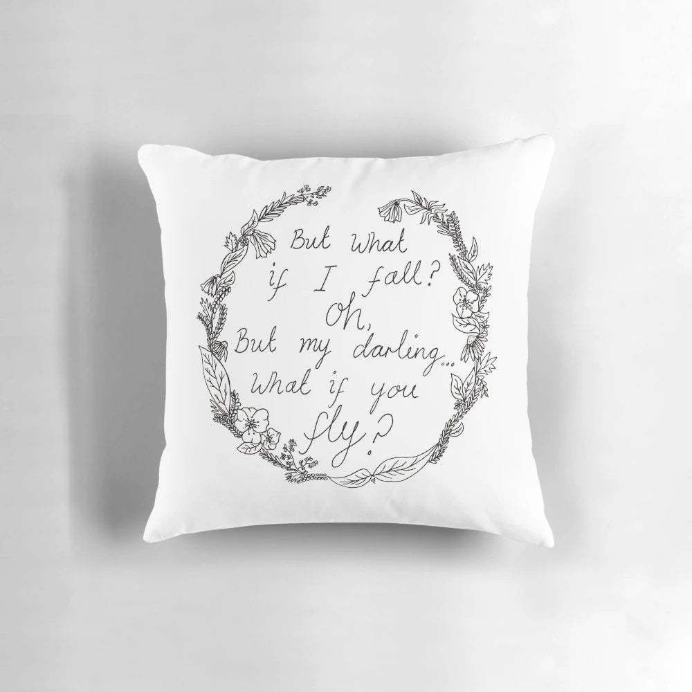 A black and white floral sketch pillow with a quote from the iconic Disney character Peter Pan