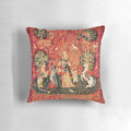 Decorative pillow featuring a medieval-inspired floral tapestry design with fantastical elements.