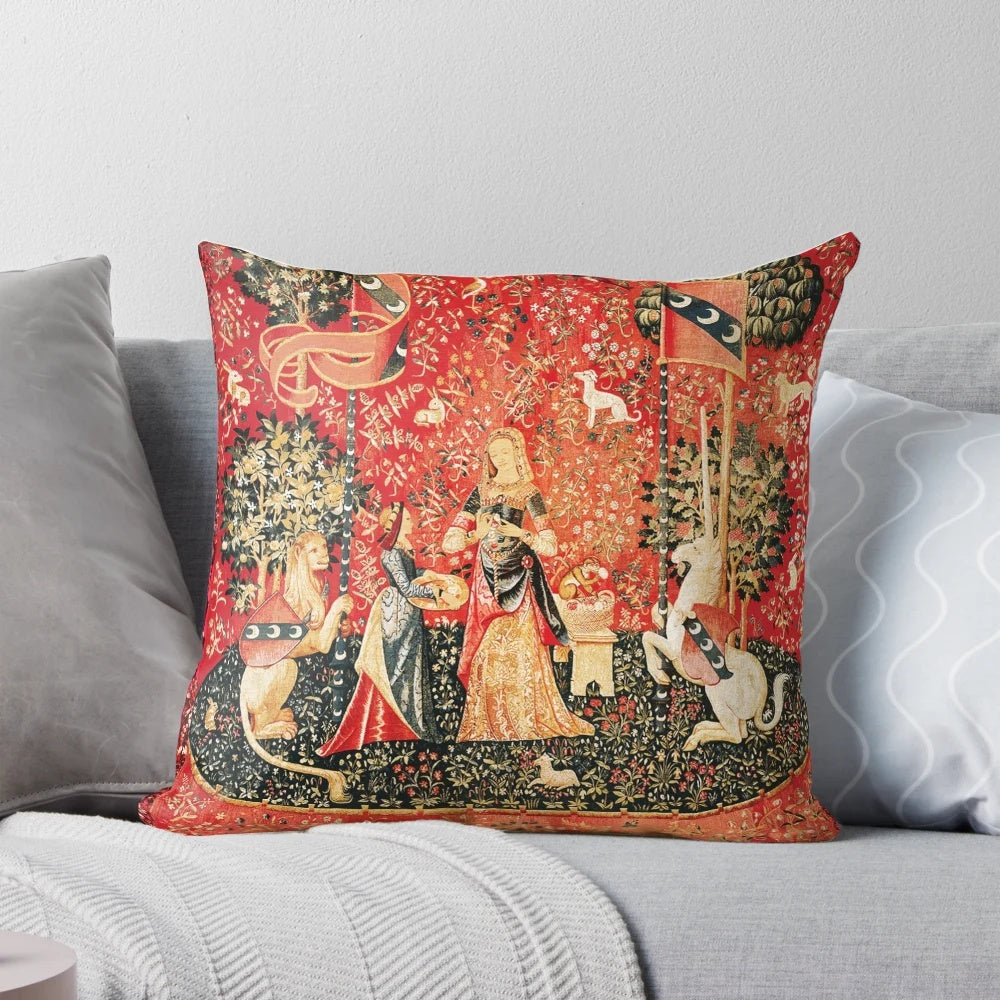 Decorative pillow featuring a medieval-inspired floral tapestry design with fantastical elements.
