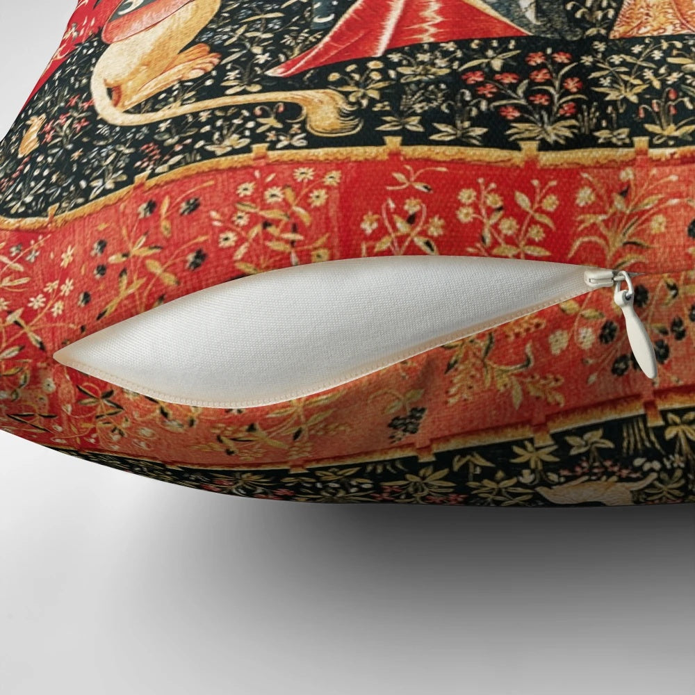 Decorative pillow featuring a medieval-inspired floral tapestry design with fantastical elements.