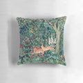 Vibrant floral tapestry pillow featuring hares and other forest animals in a nature-inspired design.