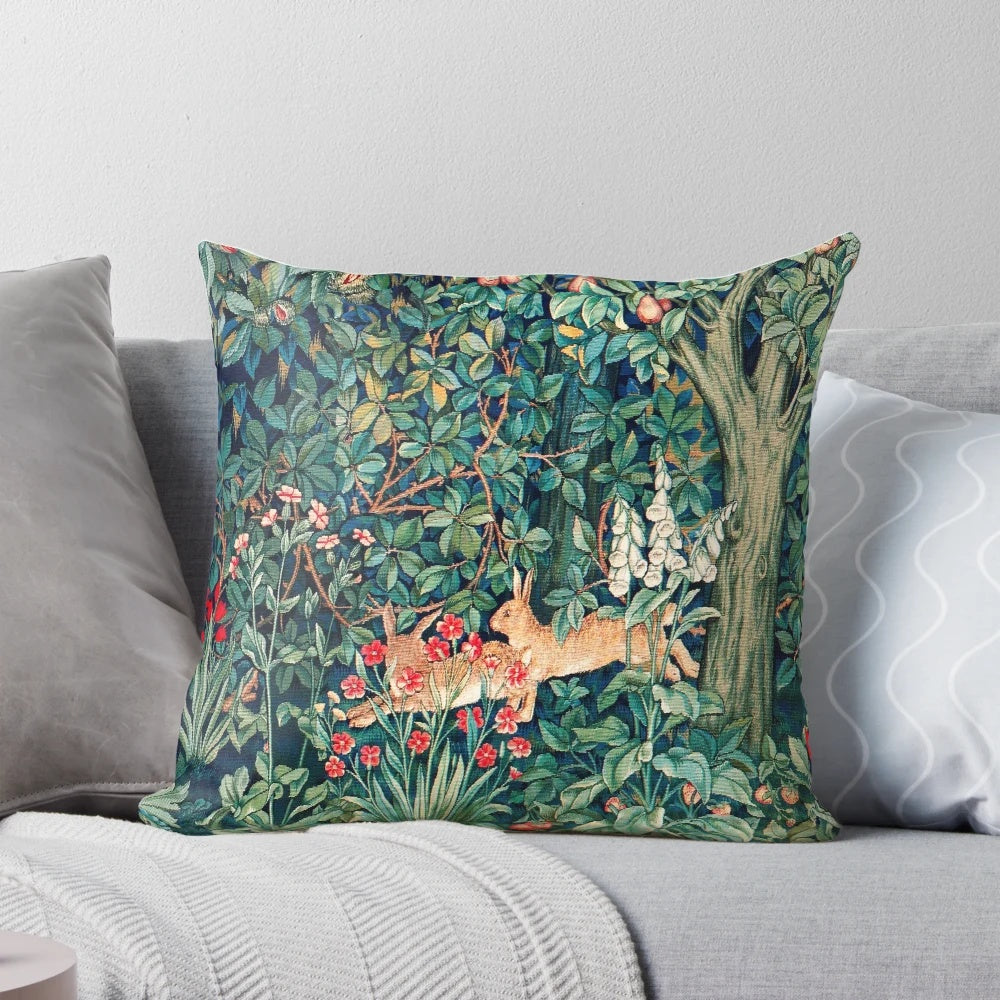Vibrant floral tapestry pillow featuring hares and other forest animals in a nature-inspired design.
