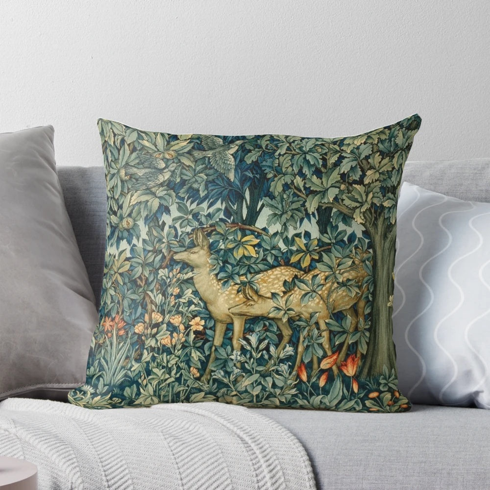 Vibrant green floral tapestry pillow with deer and birds in a serene forest setting