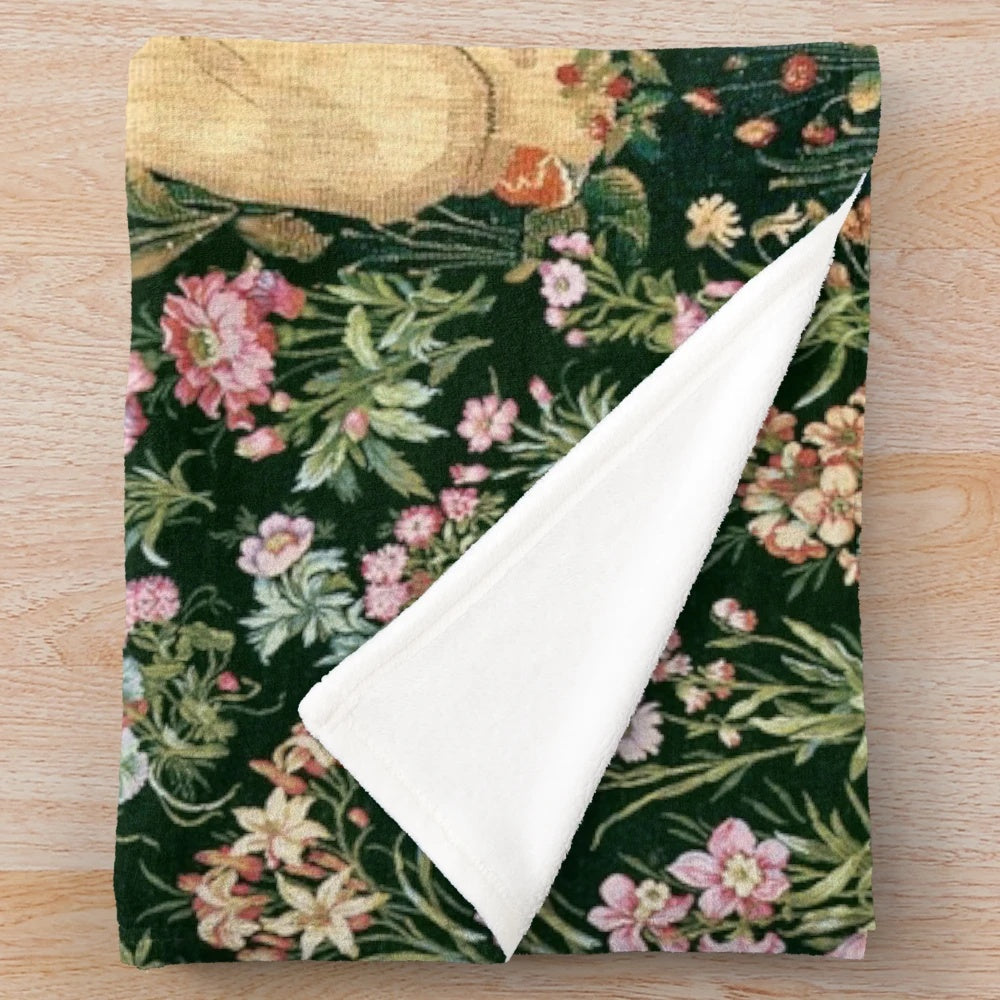 Fantasy unicorn and lady surrounded by floral and greenery on plush blanket