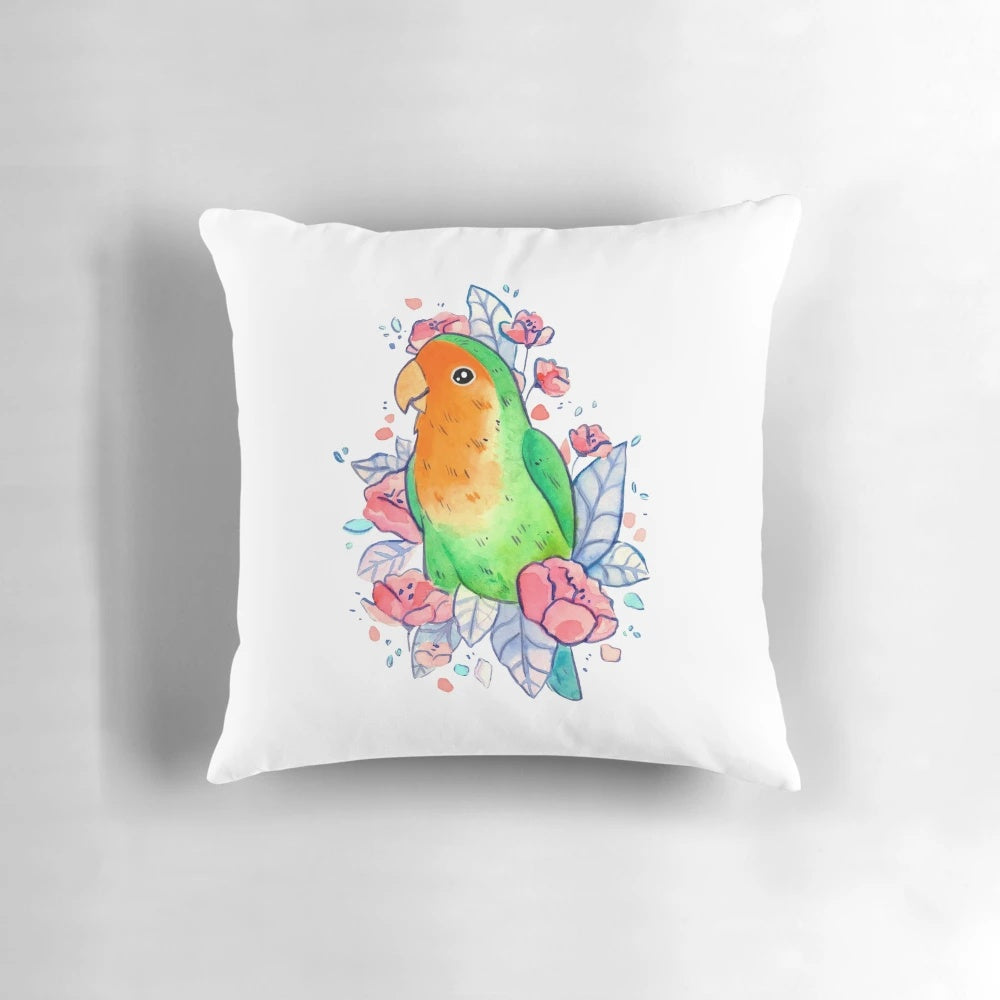 A beautiful pillow featuring a watercolor-style illustration of a pair of lovebirds surrounded by vibrant flowers.