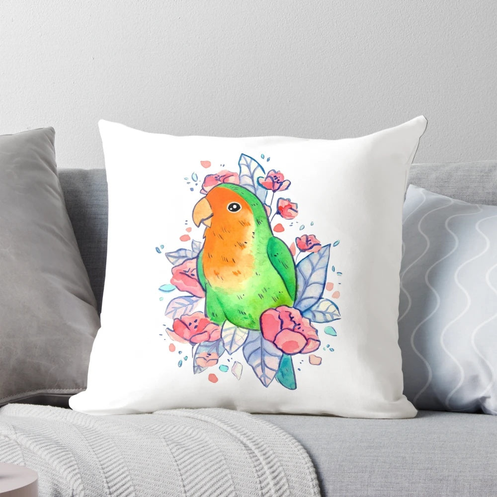 A beautiful pillow featuring a watercolor-style illustration of a pair of lovebirds surrounded by vibrant flowers.