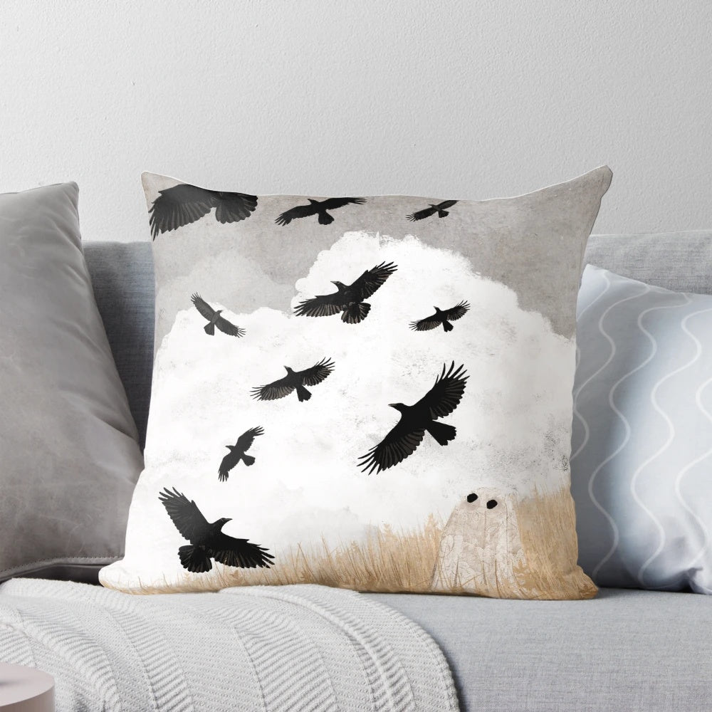 Vintage-inspired decorative pillow featuring a flock of flying crows against an autumn landscape