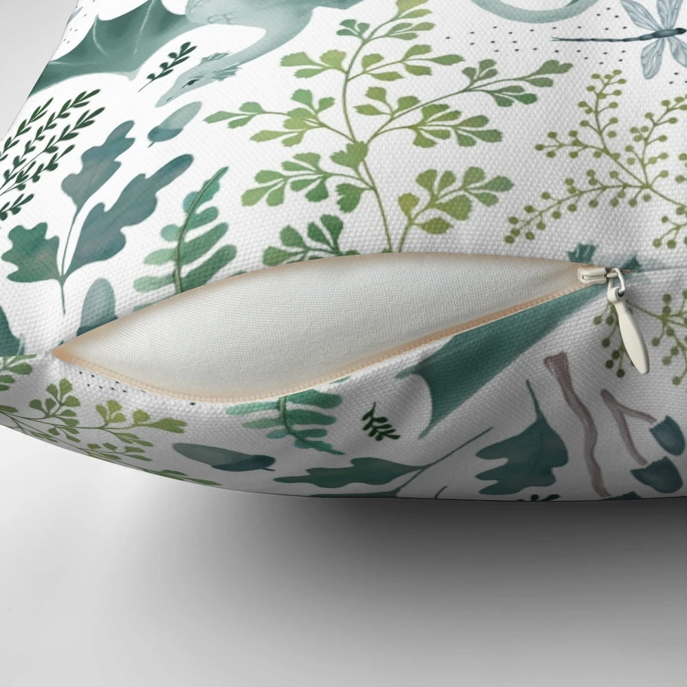 Vibrant green forest dragons printed on a white decorative pillow