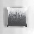 Pillow featuring a watercolor painting of a misty, foggy forest with trees and mountains.