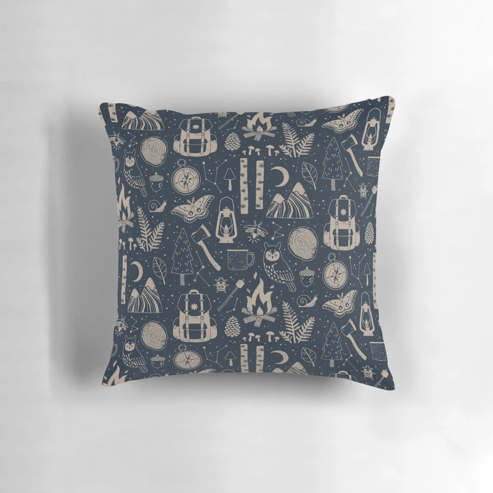 Cozy forest-themed pillow with nature-inspired design featuring trees, campfire, and wildlife