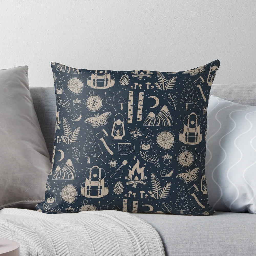 Cozy forest-themed pillow with nature-inspired design featuring trees, campfire, and wildlife