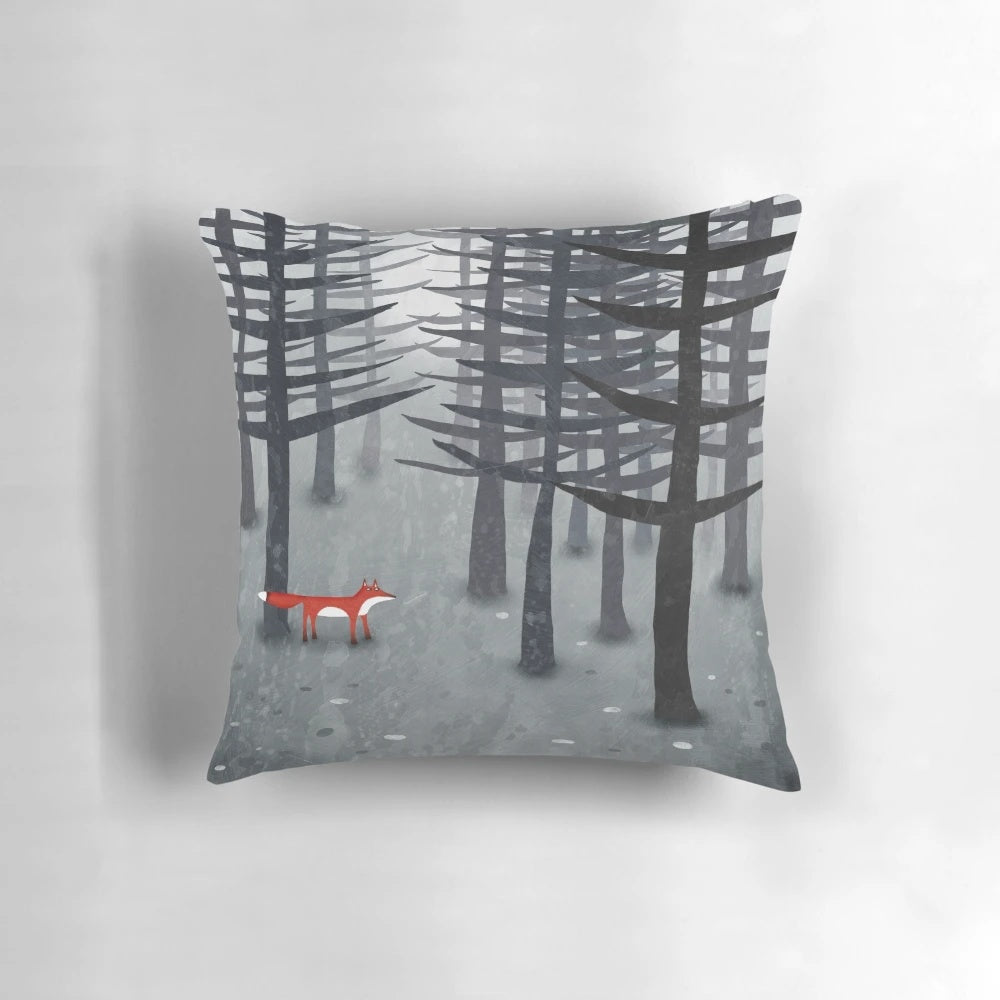 Vibrant red fox in a lush forest landscape adorning a decorative throw pillow