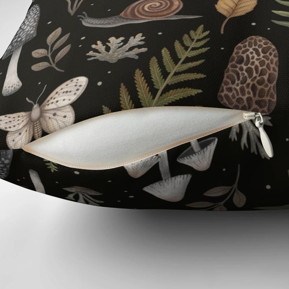 A decorative pillow featuring a whimsical pattern of forest elements like mushrooms, ferns, and moss, creating a captivating botanical and natural aesthetic.