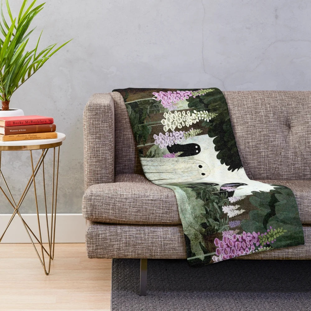 Textured plush blanket featuring ghostly foxglove flowers in a forest setting