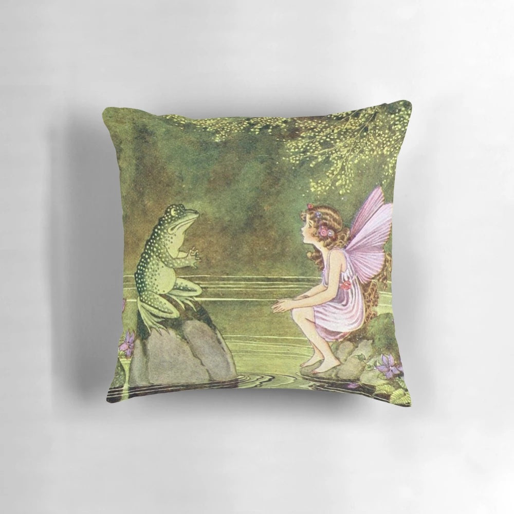 Whimsical pillow design featuring a frog and fairy in a fairytale setting