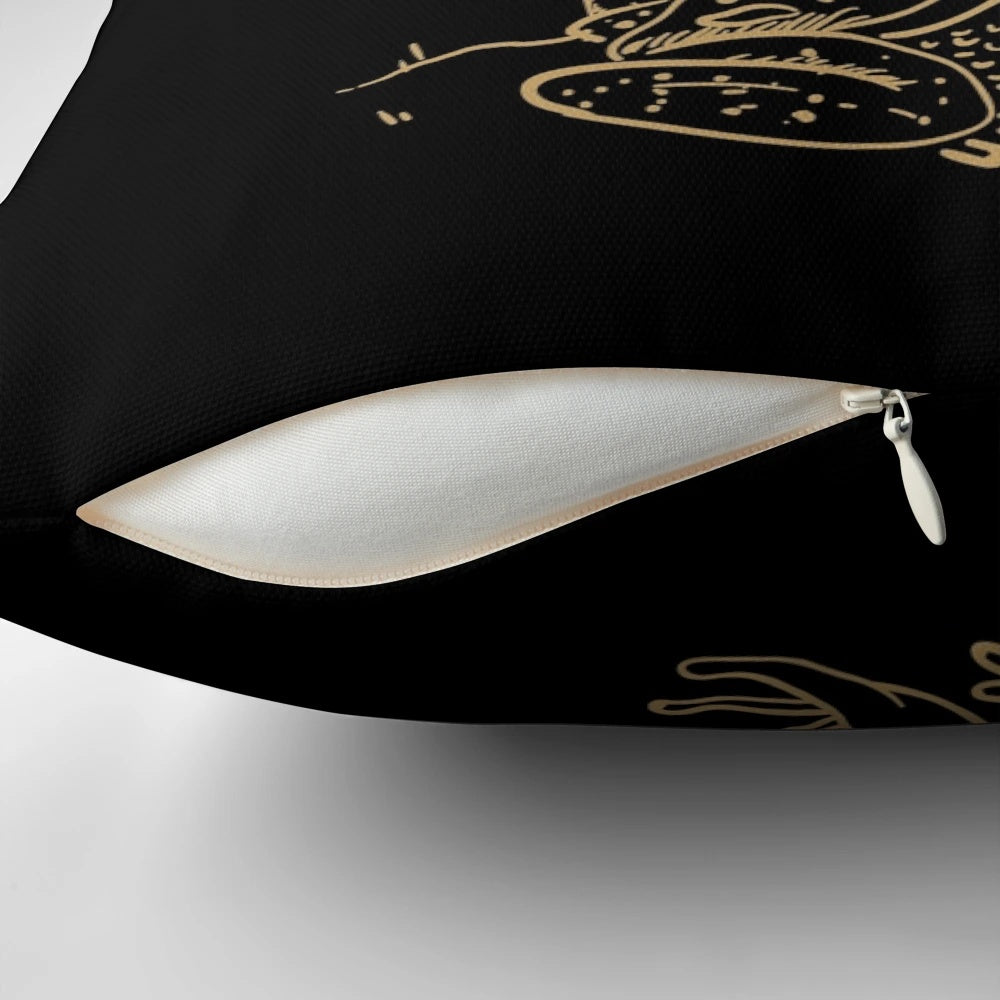 A decorative pillow featuring a frog under a mushroom, with a dark academia, cottagecore, and goth-inspired design.