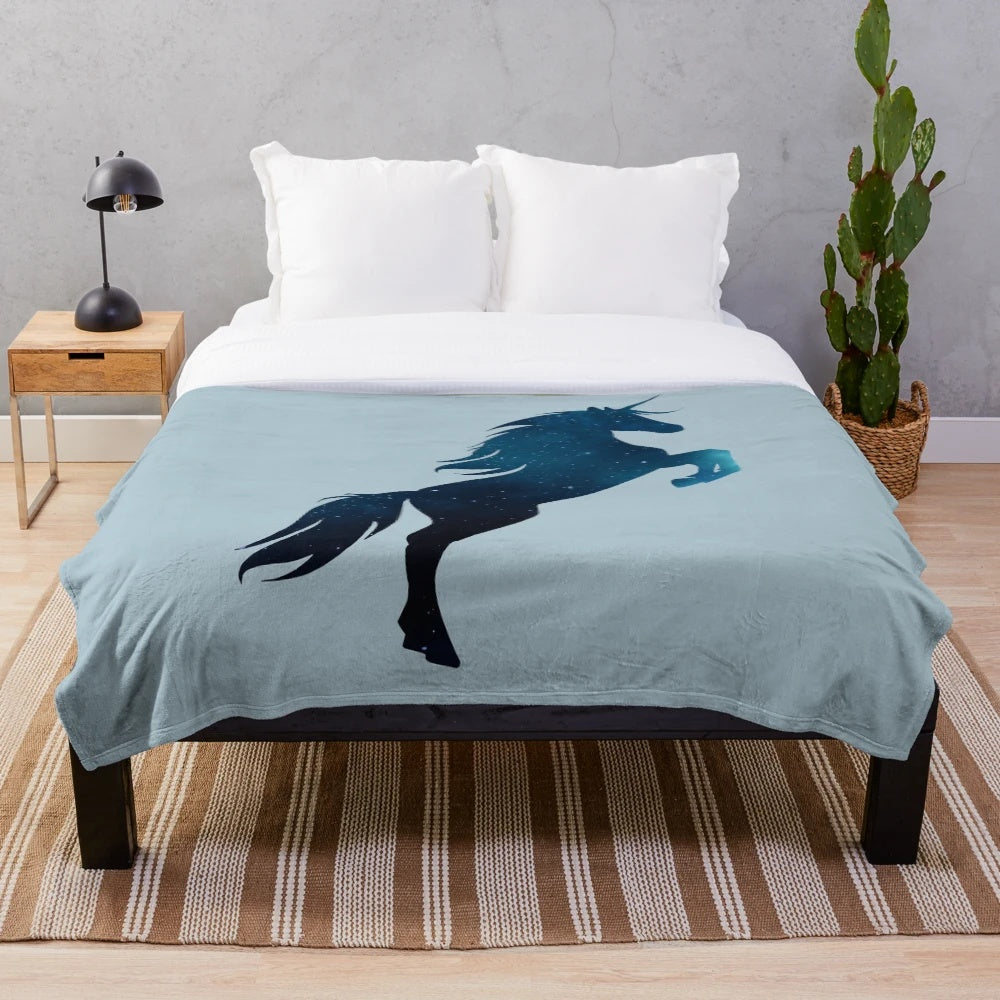 Luminous galaxy unicorn plush blanket with a magical, iridescent design
