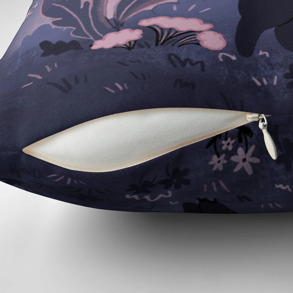 Decorative throw pillow featuring a mystical garden scene with a black cat, mushrooms, moon and stars in shades of purple.
