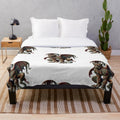 Gargoyle plush blanket with embroidered mythical creature design