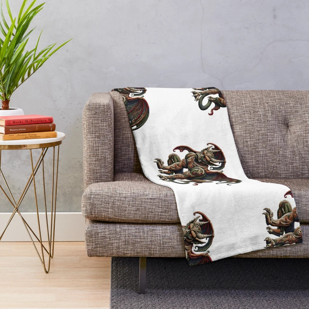 Gargoyle plush blanket with embroidered mythical creature design