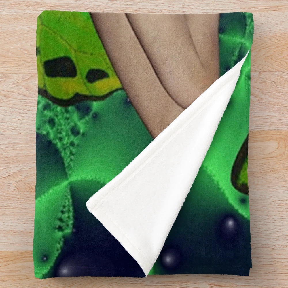 Green butterfly plush blanket with floral and nature-inspired design