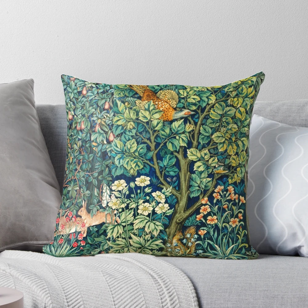 Green floral tapestry pillow with pheasant, squirrel, and hares on a nature-inspired design