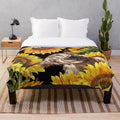 Cozy plush blanket featuring a highland cow in a sunflower garden