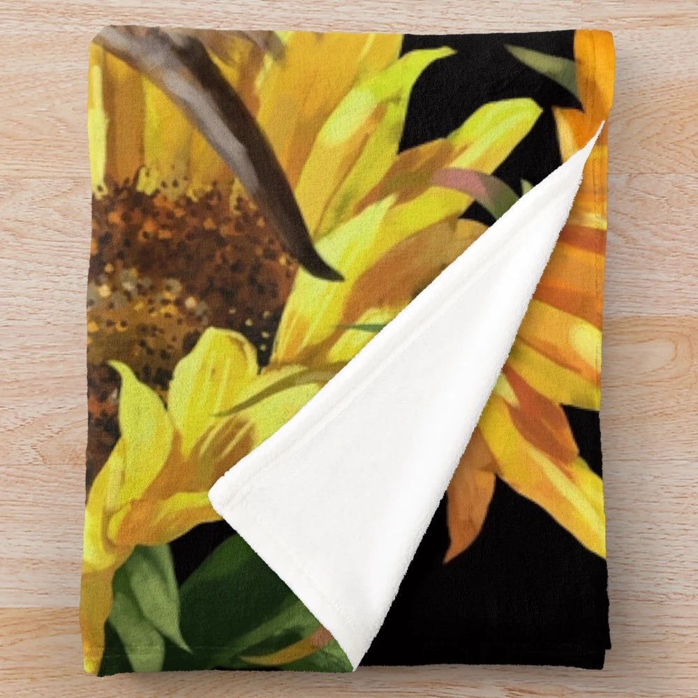 Cozy plush blanket featuring a highland cow in a sunflower garden