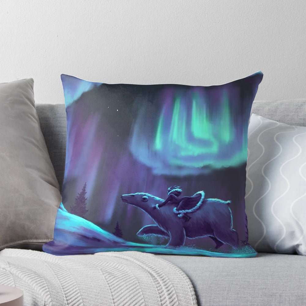 Pillow featuring fan art inspired by the "His Dark Materials" fantasy book series, with characters and the aurora borealis.