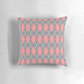 Howl's Moving Castle-inspired argyle pillow with pink, gray, and goldenrod diamond pattern