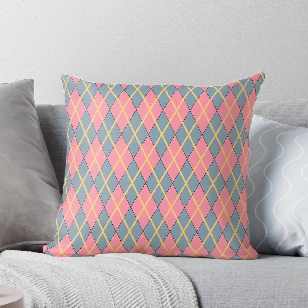Howl's Moving Castle-inspired argyle pillow with pink, gray, and goldenrod diamond pattern