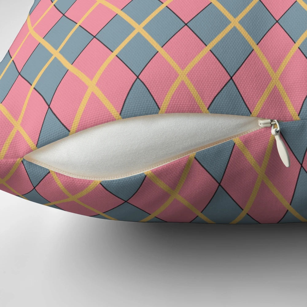 Howl's Moving Castle-inspired argyle pillow with pink, gray, and goldenrod diamond pattern