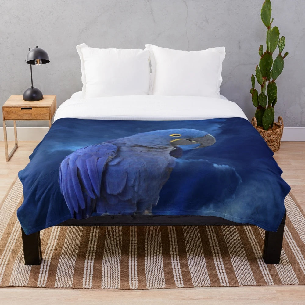 Hyacinth Macaw plush blanket with vibrant blue feathers and tropical design