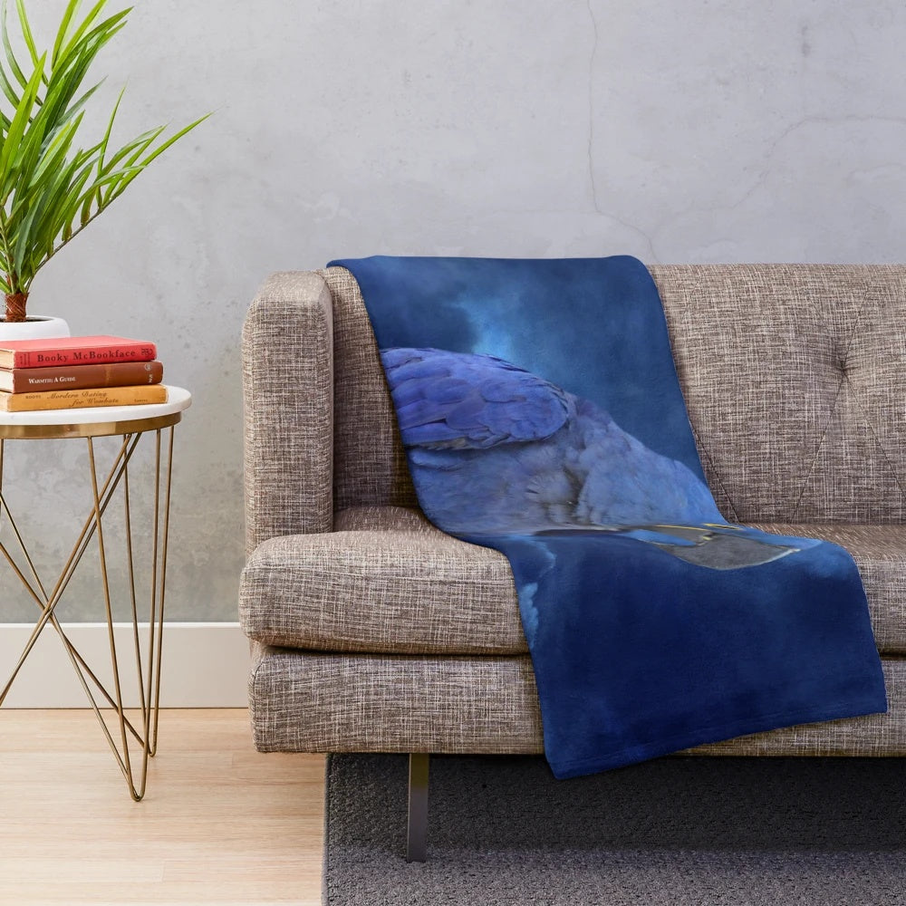 Hyacinth Macaw plush blanket with vibrant blue feathers and tropical design