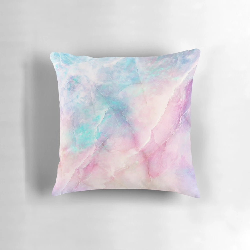 Soft, iridescent marble-patterned pillow with pastel colors and a magical, unicorn-inspired design