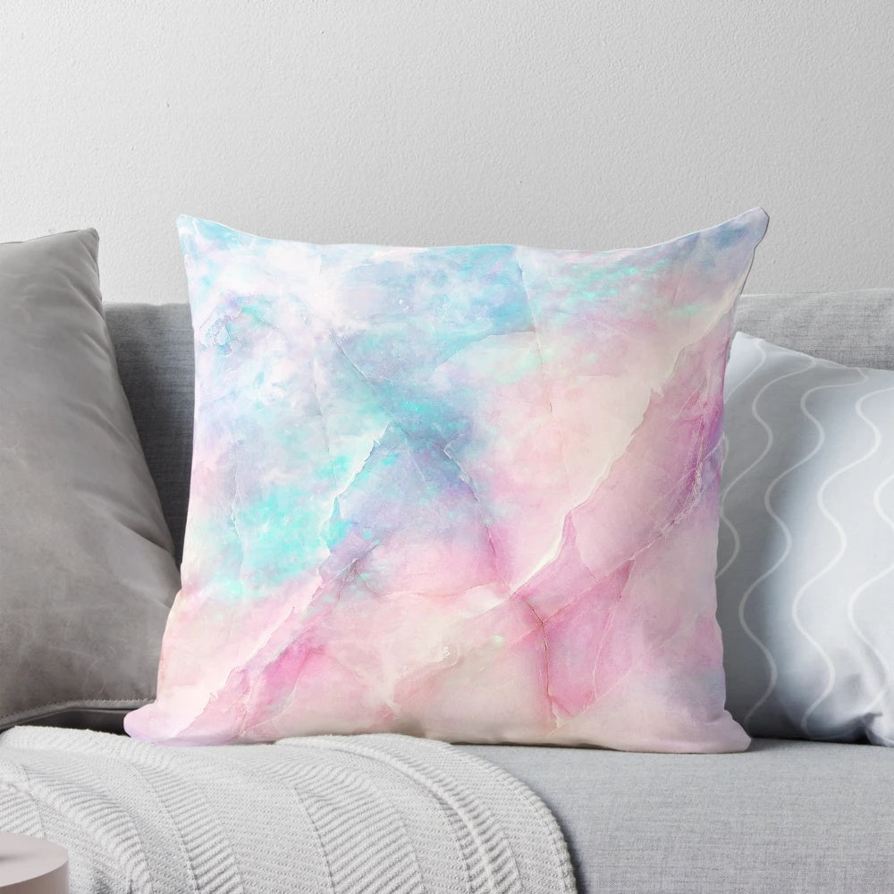 Soft, iridescent marble-patterned pillow with pastel colors and a magical, unicorn-inspired design