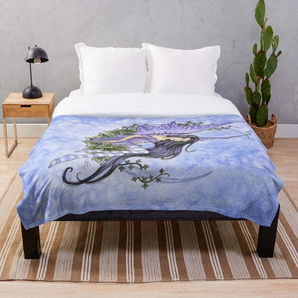 Ivy Moon Plush Blanket featuring a fairy and crescent moon design