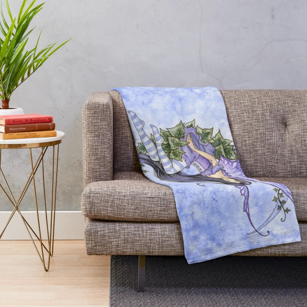 Ivy Moon Plush Blanket featuring a fairy and crescent moon design