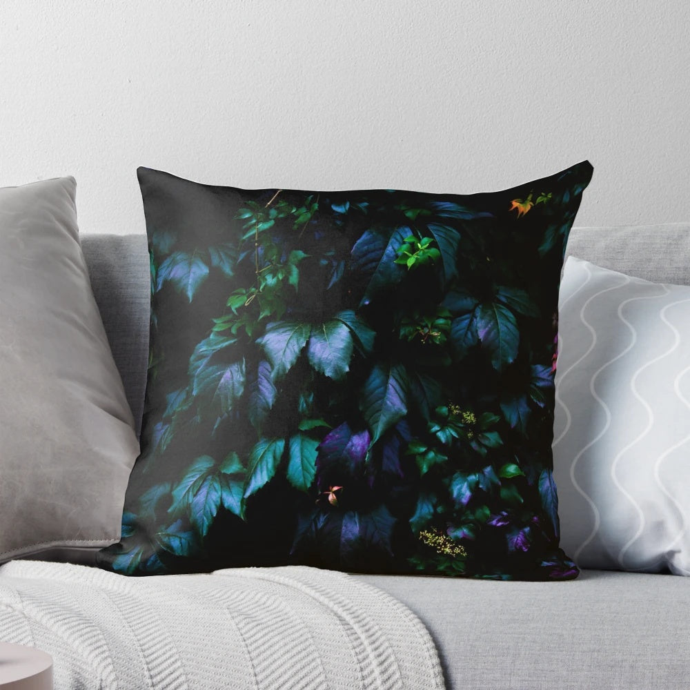 Vibrant jungle-themed pillow with lush foliage and tropical flowers